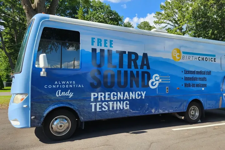 A Birth Choice mobile clinic, painted with the words free ultrasound and pregnancy testing